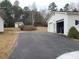 Detached garage with double doors and paved driveway at 796 S Lincoln S St, Dallas, NC 28034