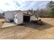 White garage with open door and patio at 796 S Lincoln S St, Dallas, NC 28034