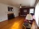 Living room with hardwood floors, fireplace and wainscoting at 796 S Lincoln S St, Dallas, NC 28034