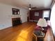 Living room with hardwood floors, fireplace and wainscoting at 796 S Lincoln S St, Dallas, NC 28034