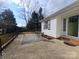 Concrete patio with seating area and backyard access at 796 S Lincoln S St, Dallas, NC 28034