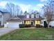 Two-story house with a large yard and attached garage at 8249 Chatham Oaks Dr, Concord, NC 28027