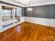 Formal dining room with hardwood floors and access to a deck at 8806 Glenside St, Huntersville, NC 28078