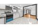 Modern kitchen featuring white cabinetry, a microwave, and stainless-steel appliances at 912 Hickory Grove Rd, Gastonia, NC 28056