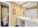 Clean bathroom with a vanity, sink, and toilet at 9813 Hanberry Blvd, Charlotte, NC 28213