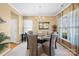 Formal dining room with chandelier and large windows at 9813 Hanberry Blvd, Charlotte, NC 28213