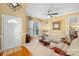 Living room with beige walls, hardwood floor, and comfy seating at 9813 Hanberry Blvd, Charlotte, NC 28213