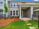 Charming backyard featuring a patio and a well-maintained lawn at 10121 Mamillion Dr, Huntersville, NC 28078