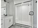 Modern bathroom featuring a glass-enclosed shower and sleek vanity at 10121 Mamillion Dr, Huntersville, NC 28078