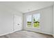Bright bedroom with double door closet and dual windows providing ample natural light at 10121 Mamillion Dr, Huntersville, NC 28078