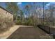 Spacious, grassy backyard with a rod iron fence offering a private outdoor space at 1124 Greenbridge Dr, Matthews, NC 28105