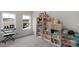 Bright ' bedroom with bookshelves, large window, and plenty of space for toys and play at 1124 Greenbridge Dr, Matthews, NC 28105