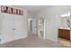 Bright bedroom featuring double closets and a view leading to the bathroom at 1124 Greenbridge Dr, Matthews, NC 28105