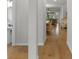 Hallway with wood floors leading to the dining room and living room at 1124 Greenbridge Dr, Matthews, NC 28105