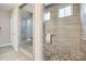 Elegant bathroom with walk-in shower and modern fixtures at 11241 Black Brant Ln, Charlotte, NC 28278