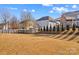 Spacious backyard with a view of neighboring homes at 138 Byers Commons Dr, Mooresville, NC 28117