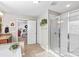 Bathroom with walk-in shower and access to main bedroom at 138 Byers Commons Dr, Mooresville, NC 28117