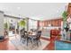 Eat-in kitchen with hardwood floors, wooden cabinets, and an island at 138 Byers Commons Dr, Mooresville, NC 28117