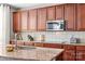 Kitchen boasts granite countertops and stainless steel appliances at 138 Byers Commons Dr, Mooresville, NC 28117