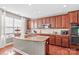 Modern kitchen with granite countertops and stainless steel appliances at 138 Byers Commons Dr, Mooresville, NC 28117