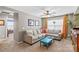 Living room with sectional sofa and teal coffee table at 138 Byers Commons Dr, Mooresville, NC 28117