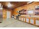 Rustic kitchen with stainless steel appliances and wooden cabinets at 15554 Highway 601 S Hwy, Midland, NC 28107