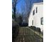 A well-maintained backyard featuring a newly planted lawn and dark metal fencing at 2002 Summey Ave # 4, Charlotte, NC 28205