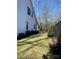 A well-maintained backyard featuring a newly planted lawn and dark stained fencing at 2002 Summey Ave # 4, Charlotte, NC 28205