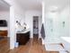 Elegant bathroom with walk-in shower and soaking tub at 2002 Summey Ave # 4, Charlotte, NC 28205