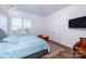 Serene bedroom with large window, hardwood floors and built-in closets at 2002 Summey Ave # 4, Charlotte, NC 28205