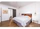 Bright bedroom with hardwood floors and ensuite bathroom access at 2002 Summey Ave # 4, Charlotte, NC 28205