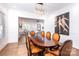 Formal dining room features a rich wood table and stylish lighting at 2002 Summey Ave # 4, Charlotte, NC 28205