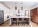 Modern kitchen with island, stainless steel appliances, and white cabinetry at 2002 Summey Ave # 4, Charlotte, NC 28205
