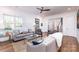 Bright and airy living room with hardwood floors and neutral decor at 2002 Summey Ave # 4, Charlotte, NC 28205