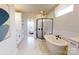Elegant bathroom with soaking tub, shower, and marble flooring at 213 English Arbor Dr # 10, Fort Mill, SC 29715
