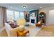 Spacious living room with a fireplace and comfortable seating at 213 English Arbor Dr # 10, Fort Mill, SC 29715