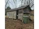 Old wooden shed in need of repair, located in backyard at 214 W Ohio W Ave, Bessemer City, NC 28016