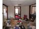 Cluttered living room with boxes and furniture at 214 W Ohio W Ave, Bessemer City, NC 28016