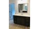 Bathroom vanity with dark brown cabinets and white countertop at 2173 Millennium Dr # 40, Lancaster, SC 29720