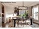 Formal dining room with chandelier, large windows, and wood flooring at 2173 Millennium Dr # 40, Lancaster, SC 29720