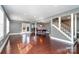 Finished basement with hardwood floors and a pool table at 2510 Tulip Hill Dr, Charlotte, NC 28270