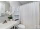 Small bathroom with white vanity and shower/tub combo at 2510 Tulip Hill Dr, Charlotte, NC 28270