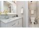 Clean bathroom, featuring a white vanity with marble countertop at 2510 Tulip Hill Dr, Charlotte, NC 28270