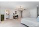 Bright bedroom with ensuite bathroom access and a built-in workspace at 2510 Tulip Hill Dr, Charlotte, NC 28270
