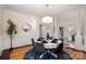 Elegant dining room featuring hardwood floors and chair rail at 2510 Tulip Hill Dr, Charlotte, NC 28270