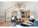Gathering room with hardwood floors, fireplace, and views to kitchen at 2510 Tulip Hill Dr, Charlotte, NC 28270