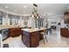 Open kitchen with large island, stainless steel appliances, and breakfast bar at 2510 Tulip Hill Dr, Charlotte, NC 28270