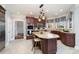 Kitchen with granite island, stainless steel appliances, and wood cabinetry at 2510 Tulip Hill Dr, Charlotte, NC 28270