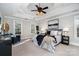 Main bedroom with ceiling fan and large window at 2510 Tulip Hill Dr, Charlotte, NC 28270