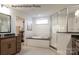Elegant bathroom with soaking tub, walk-in shower, and double vanity at 3535 Rapport Ct # 023, Lancaster, SC 29720